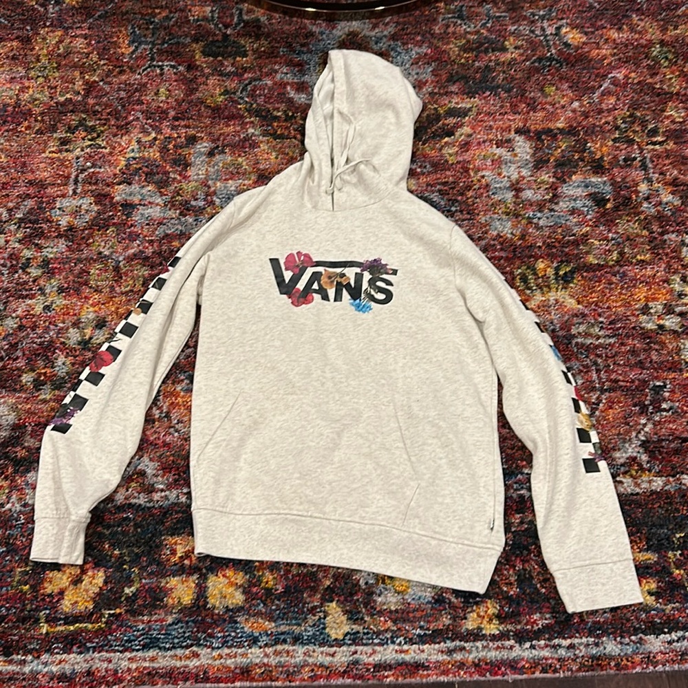 Very good, flowery sweatshirt, very comfortable rarely been worn